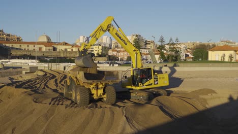 PORTO,-PORTUGAL,-Old-lighthouse-in-Douro-river-with-construction-site-in-background-to-release-and-clear-some-of-the-sand-in-the-river-mouth