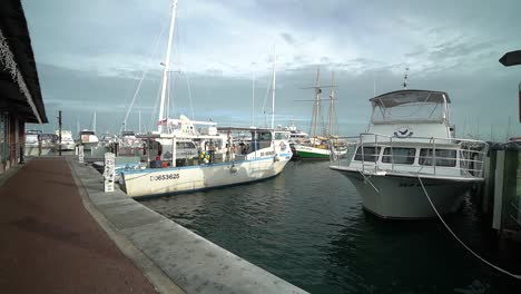 Wide-Shot-of-Boats-Docked-in-Key-West,-Florida-on-a-Cloudy-Day
