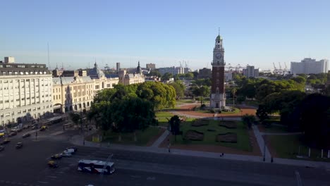 Aerial-shot-of-Retiro-railway-station-and-Torre-Monumental-revealing-Rio-de-la-Plata-in-background