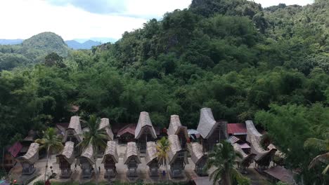 Aerial-over-Tongkonan-House,-traditional-house-for-toraja-people-Indonesia