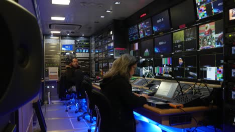 Broadcast-truck-interior-with-people-working-on-a-broadcast-production---Portugal