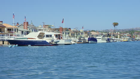 Slow-motion-Newport-Harbor-Luxury-Homes-and-Yachts-on-the-Water