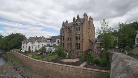 A-wide-shot-of-the-Lindsay-House-next-to-the-Snuff-Mill-Bridge