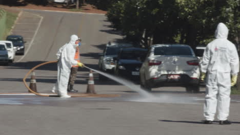 Brazilian-Military-team-cleanses-a-road-outside-of-a-hospital