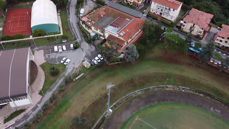 Fast-revealing-aerial-view-of-soccer-stadium-quite-empty-for-Corona-Virus-pandemic