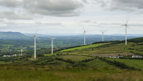 Time-lapse-of-wind-turbines-in-rural-countryside-of-Ireland-during-a-cloudy-day