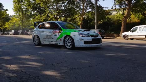 Subaru-Impreza-Car-Driving-And-Warming-Up-Engine-Before-The-Race-Start---tracking-shot