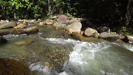 Very-relaxing-tropical-water-stream-at-Ulu-Bendul,-Malaysia,-Negeri-Sembilan