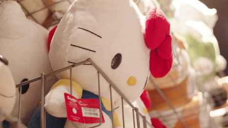 Close-up-shot-of-famous-Hello-Kitty-pillow-plushie,-for-selling-in-asian-store-during-night