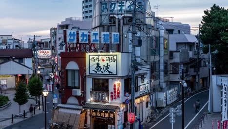 Timelapse-of-typical-residential-area-in-Tokyo,-Japan-with-some-illuminations-at-dusk-and-people-walking---Push-Out-Shot