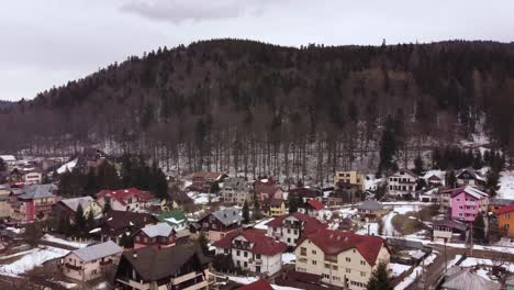 Aerial-Shot-With-Small-Village-Houses-At-Mountain