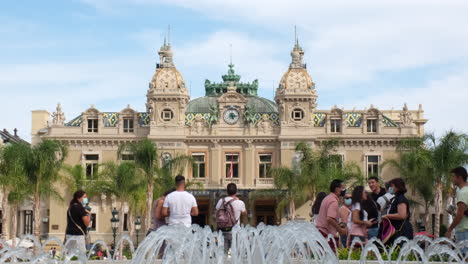 Crowd-of-people-and-tourists-taking-selfie-at-the-Grand-Casino-Square-in-Monaco,-Monte-Carlo,-France