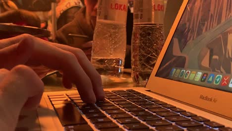 hands-of-young-man-using-a-laptop-in-lviv-Ukraine