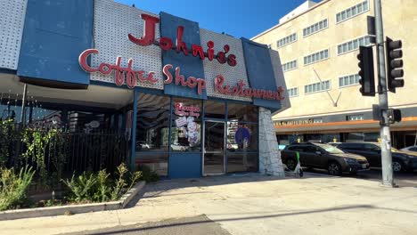 Famous-and-iconic-Johnie's-Coffee-Shop-restaurant-featured-in-many-Hollywood-movies---establishing-shot