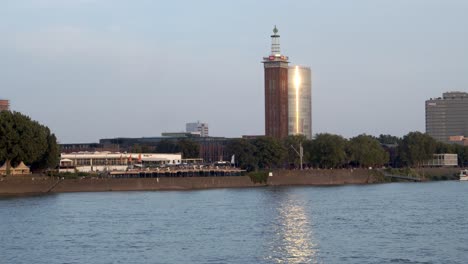 Cologne,-North-Rhine-Westphalia,-Germany,-circa-2019:-Hohenzollern-Bridge-near-the-Cathedral,-iconic-buildings,-commuting-near-the-Train-Pass,-and-some-corners-of-the-city