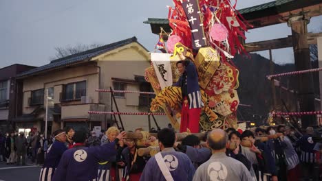Sagicho-Matsuri-Festival,-Local-Japanese-People-Ride-on-Mikoshi-Float-4k