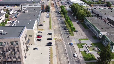Aerial-View-of-Street-Traffic-and-Road-Reconstruction-in-Suburbs-of-Kaunas,-Lithuania,-Drone-Shot