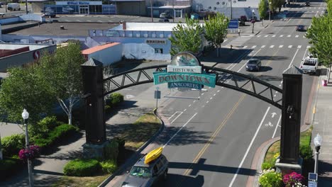High-up-shot-of-the-historic-downtown-welcome-sign-in-Anacortes,-WA