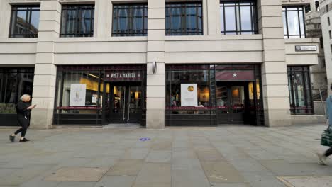 City-of-London-England-September-2022-Exterior-establishing-shot-of-central-london-Pret-A-Manger-coffee-chain-store