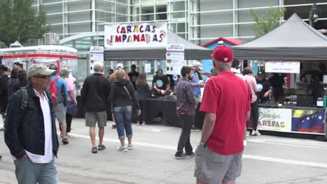 Taste-of-Madison-Man-with-Beer-walking-by