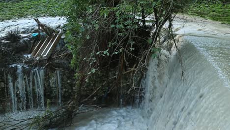 flooding-of-the-river-that-crosses-the-bridge-after-heavy-rains-in-the-central-Italy