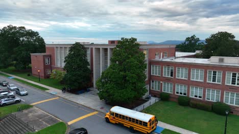 School-bus-parked-in-front-of-building