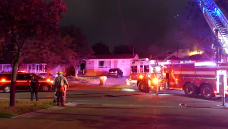 Fireman-put-out-the-fire-of-the-house-in-Mississauga,-Ontario,-Canada