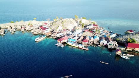 Drone-footage-of-the-Bajo-Village,-a-Fishermen-Village-of-the-coast-of-the-Island-Malenge,-Togean-Islands,-Sulawesi,-Indonesia