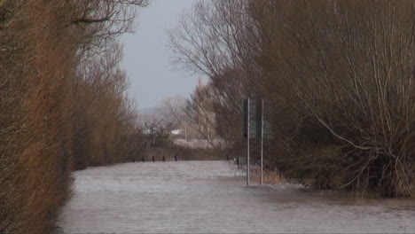 UK-February-2014---The-main-road-between-Lyng-and-Burrow-Bridge-is-cut-off-by-deep-floodwater-during-the-Somerset-Levels-flood