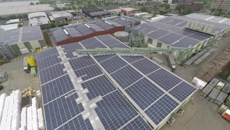Flying--over-industrial-area-with-solar-panels