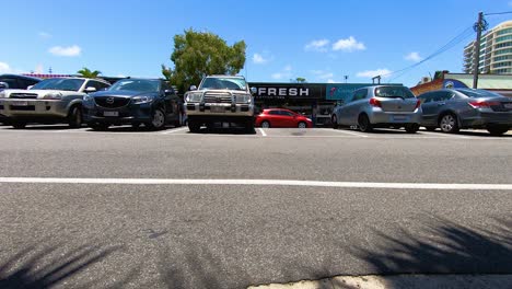 A-time-lapse-of-cars-flying-past-with-a-beautiful-blue-sky-above