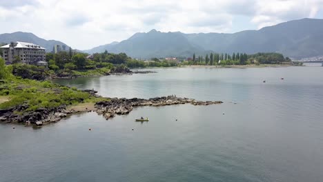 Aerial-view-of-minamitsuru-beach-people-fishing