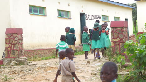 Children-Walking-into-School-in-Rural-Zimbabwe,-Africa-Excited-to-Learn