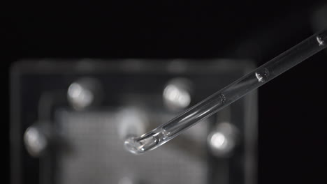 Detail,-Close-Up-of-Air-bubbles-go-through-water-filled-tubes-in-an-experimental-science-exhibition