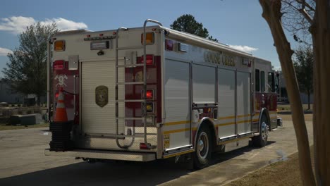 Fire-rescue-truck-drives-in-a-driveway