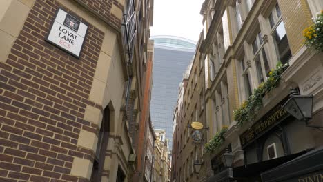 London-Street-With-Skyscraper-In-The-Background-Tilt-Up