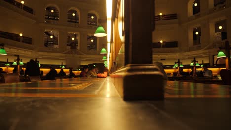 State-Library-Victoria-at-nighttime-people-studying-at-melbourne-library-Melbourne-tourism-attractions,-melbourne-library