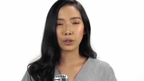 Young-Asian-20s-Woman-black-curl-smooth-hair-cosmetic-make-up-pretty-face-look-in-white-strip-shirt-express-emotion-on-white-background-for-viral-clip-Casting-or-advertising