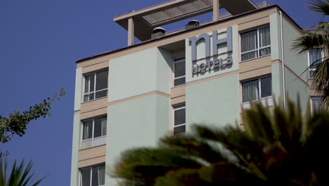 Hotel-in-La-Spezia,-Italy-with-a-plants-and-bushes-in-the-foreground