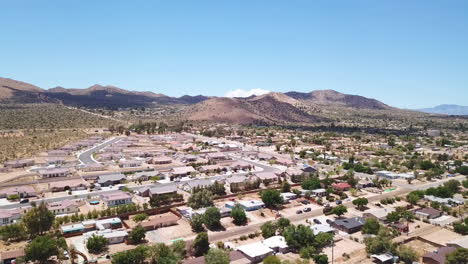 Yucca-Valley,-California-neighborhood-streets-and-houses,-drone-4k