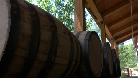 A-low-angle-close-up-of-Bourbon-Barrels-at-the-High-West-Distillery-near-Wanship,-Utah