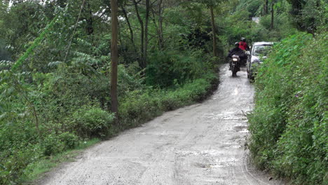 Kathmandu,-Nepal---September-27,-2019:-Traffic-and-vehicles-on-a-dangerous,-muddy-mountain-road-in-the-foothills-of-Kathmandu,-Nepal-on-September-27,-2019