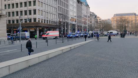 Police-cars-driving-trough-the-centre-of-Frankfurt,-Germany