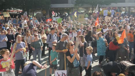 Youth-Climate-Strike-in-Sheffield-City-Centre-2019-in-front-of-the-City-Hall-with-speakers-and-representatives-young-and-students-and-older-adults