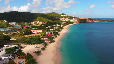 Drone-footage-of-the-most-amazing-beach-in-Grenada-with-resorts-lining-the-shoreline,-Grand-Anse-Beach