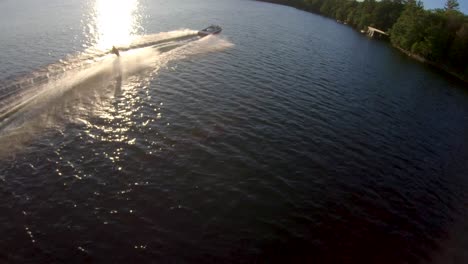 Slalom-Waterskiing-Caucasian-Man-Waves-At-Drone