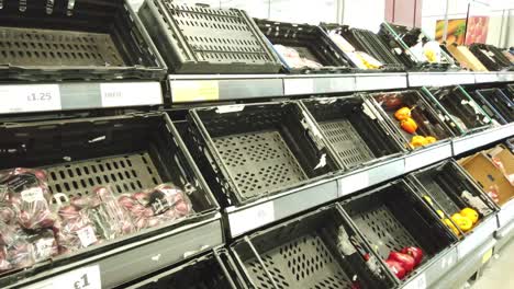 Panic-buying-and-stockpiling-in-supermarket,-Sainsbury's-in-the-UK,-occurring-as-a-result-of-the-Coronavirus-outbreak