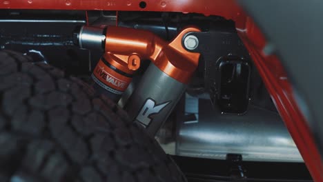 Close-Up-on-the-Rear-Suspension-of-a-Brand-New-Ford-F150-Raptor-Truck