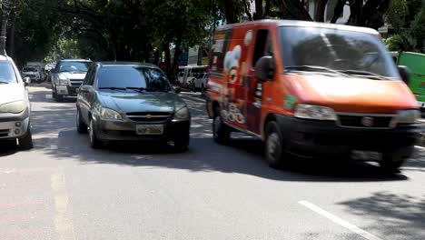 Busy-city-street-traffic-in-Manaus,-Brazil---establishing-shot