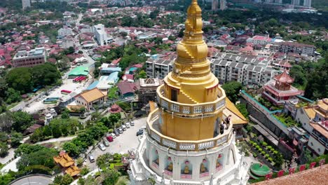 Kek-Lok-Si-Buddhist-temple-pagoda-shrine-golden-spire,-Aerial-drone-orbit-around-shot